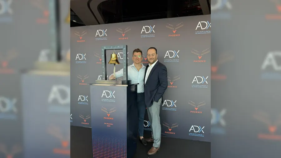 Three frames: the ADX listing ceremony, the first-day trading board, and the Phoenix Group website.